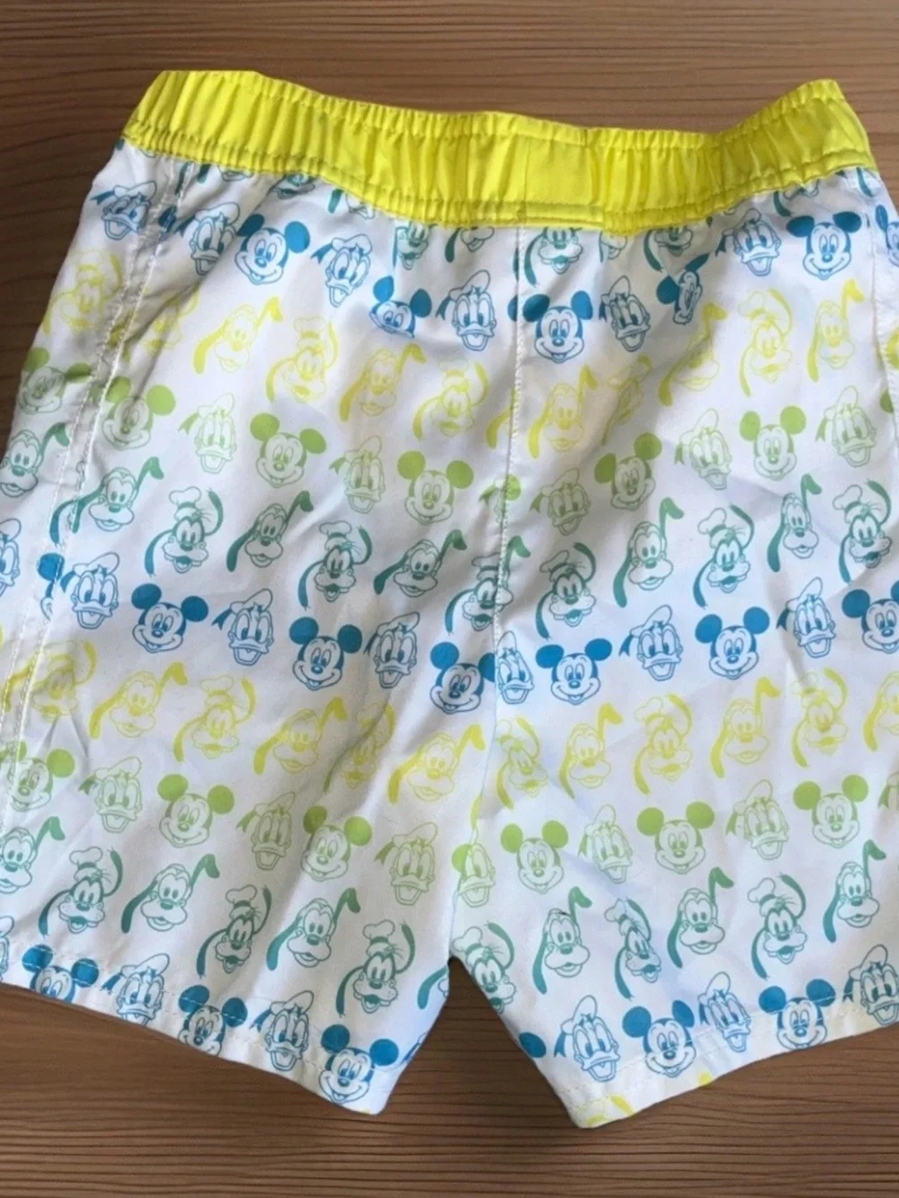 Disney Boys White Swim Trunks with Yellow Waistband and Blue Accent
